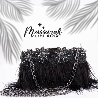 Soiree clutch with feathers
