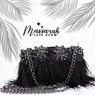 Soiree clutch with feathers