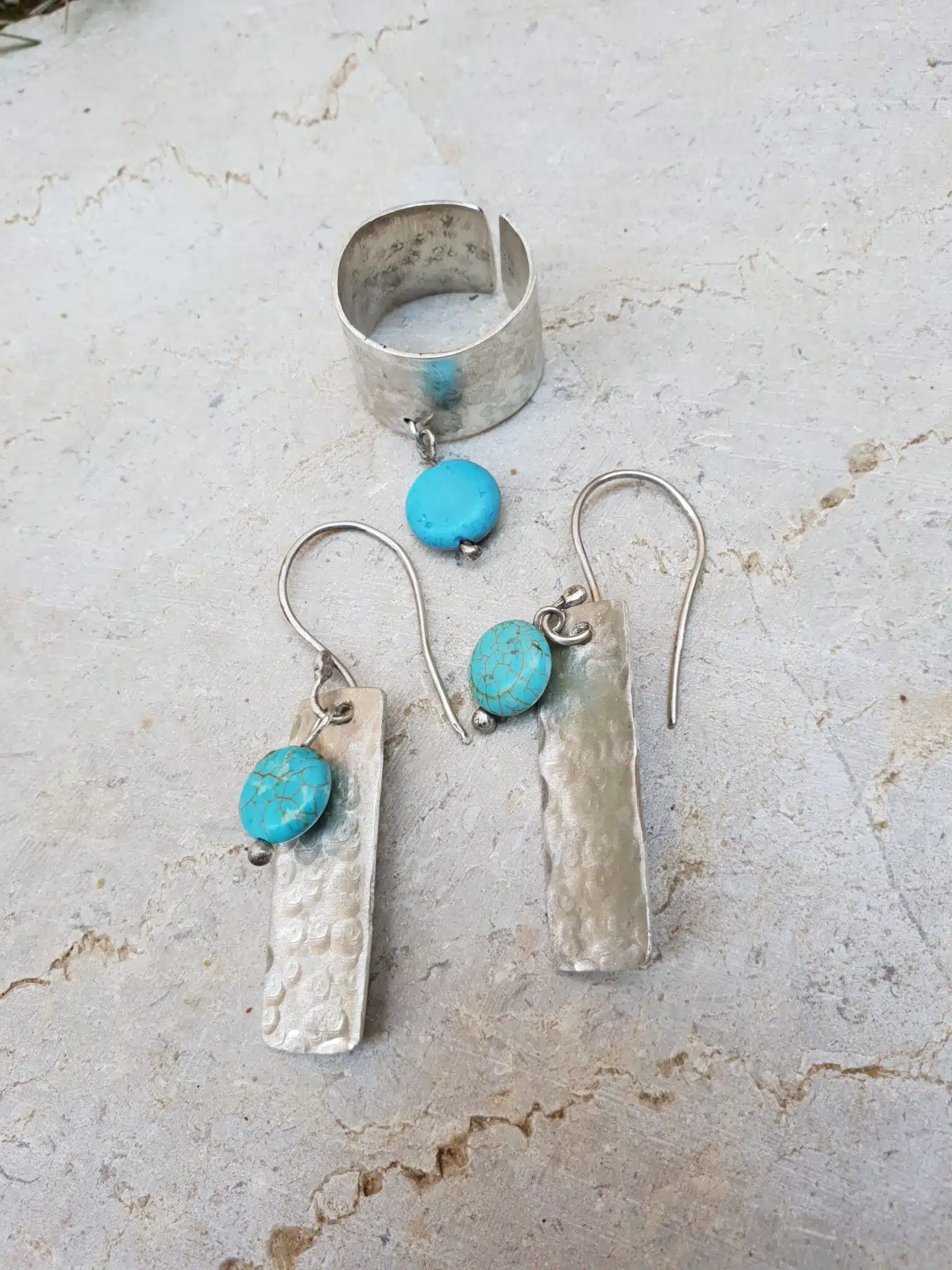Silver hammered ring with dangling turquoise 1 Silver hammered ring with dangling turquoise