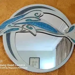 Round mirror with wooden dolphin filled with resin colours