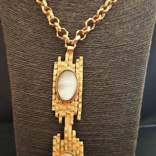 Two oval mother of pearls irregular bars