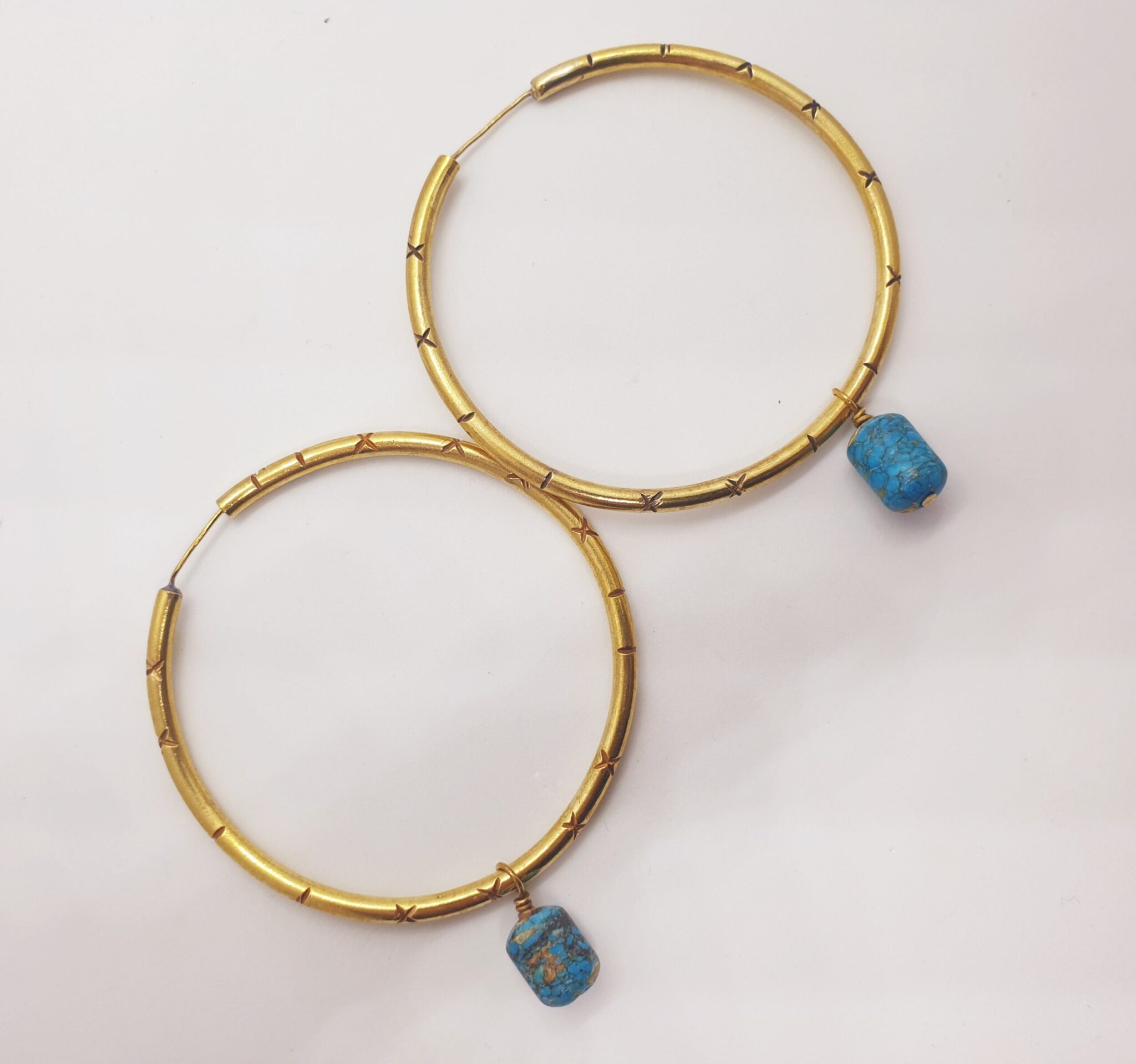 Textured hoop with dangling stone 2 20230309 124305 scaled scaled