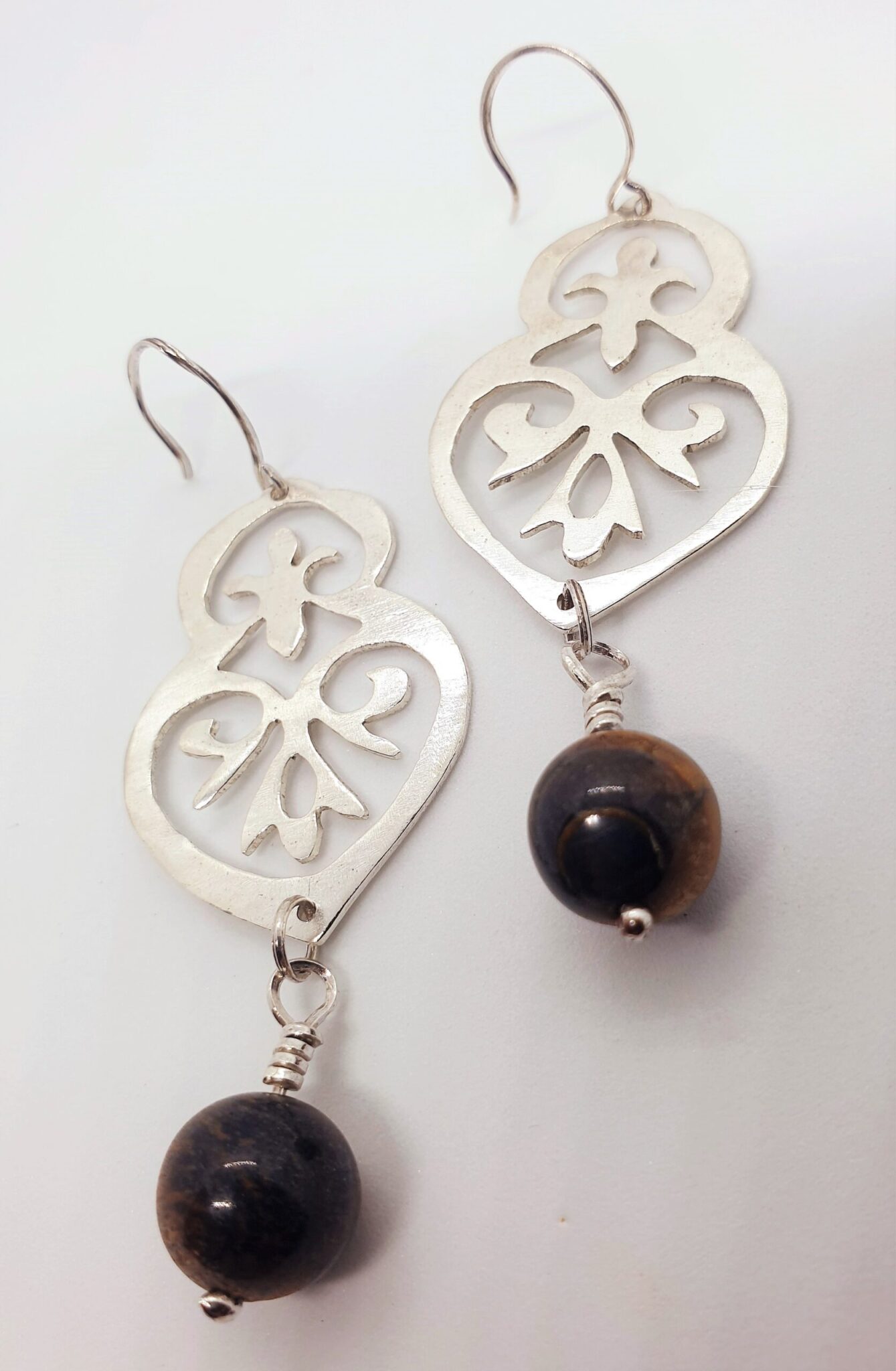 Ornamental silver earring with dangling tiger eye 4 20230309 131210 scaled scaled