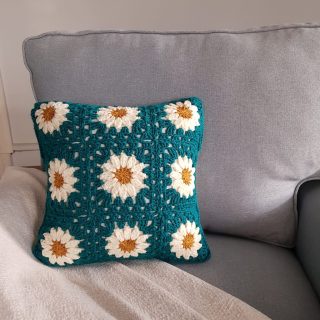 Teal daisy cushion