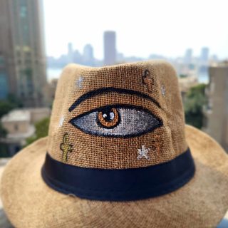 Beige hat the eye