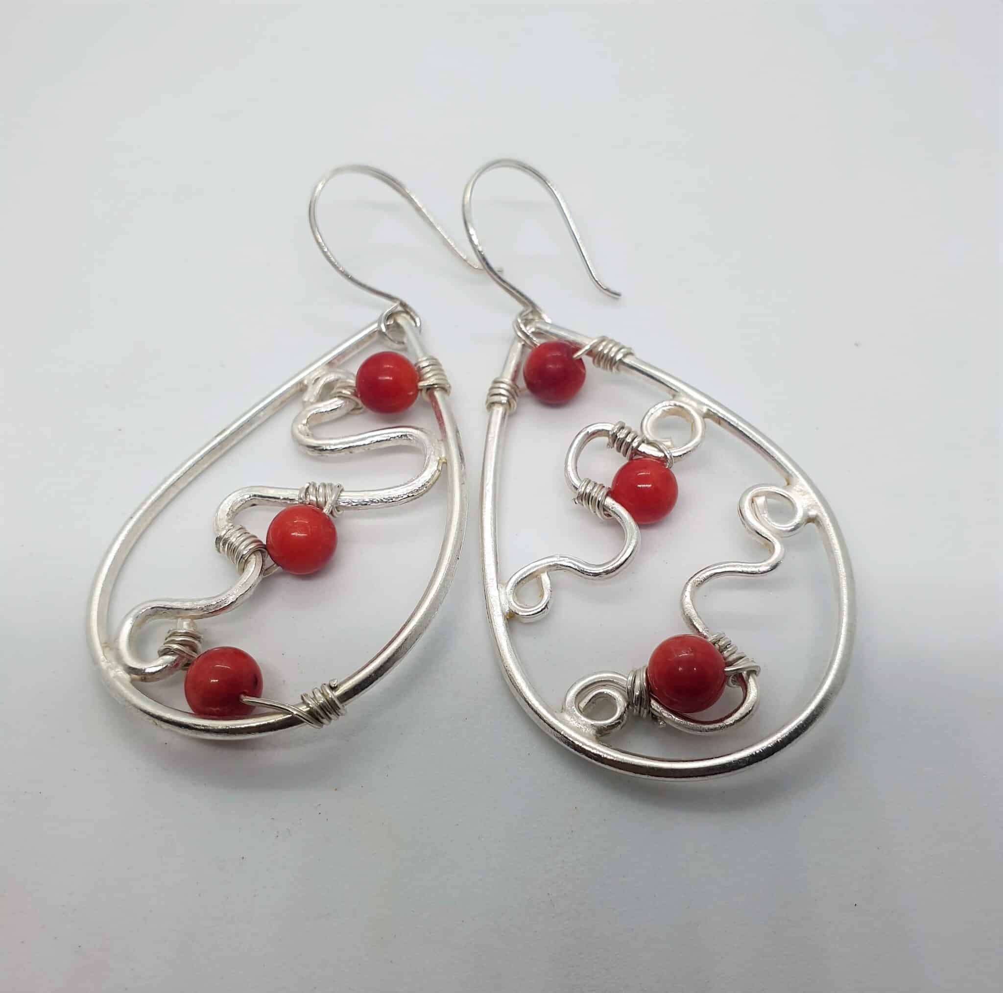 Teardrop silver earring with tiny red amber 2 20230615 131255 retouched scaled