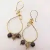 Brass wire earring with dangling sphere agates
