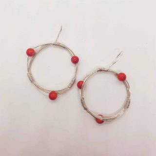 Thin silver wire earring with red amber