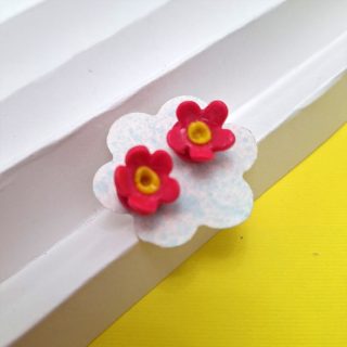 polymer clay studs fuchsia flower with yellow core