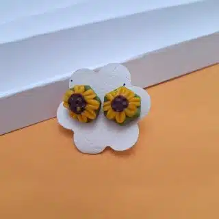 polymer clay studs sunflower with green background