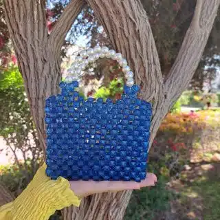 Blue crystals with off-white pearls.