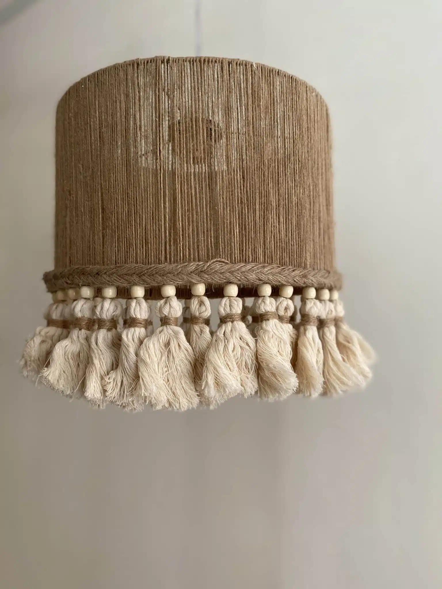 Jute and tasseled macrame chandelier with beads 4 2B1EE735 5E41 490D AFE7 D2FA027C18AB scaled