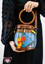 A bag made of genuine leather bearing the design of “Pooh”