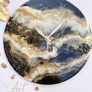 Black ,white and gold wall clock