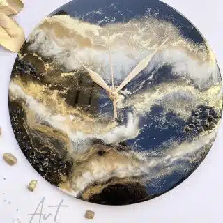 Black ,white and gold wall clock