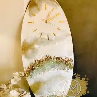Golden moon oval clock