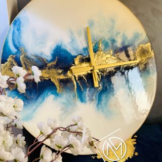 Blue rays resin wall clock