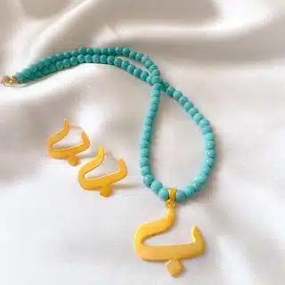 Arabic initial earring