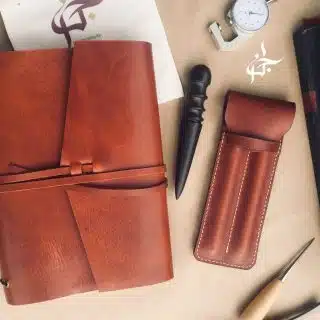 Set of leather notebook and pen case