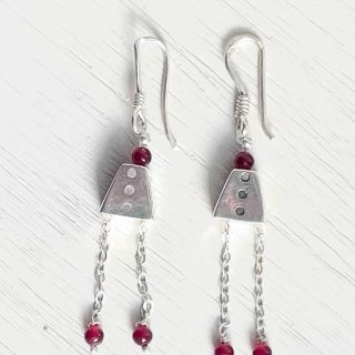 Silver earring with ruby beads