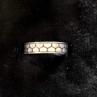 Sterling silver ring with black enamel.