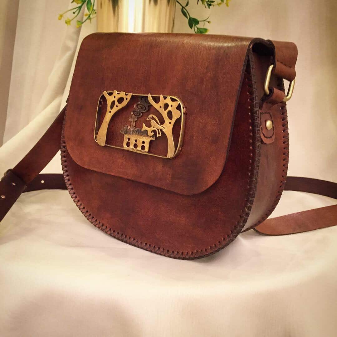 0102 Handmade Genuine leather cross bag with handmade copper figure 1 0102 Handmade Genuine leather cross bag with handmade copper figure