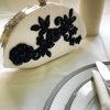 White seashell clutch