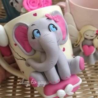 Elephant with balloons mug