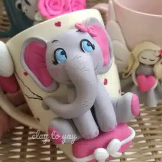 Elephant with balloons mug