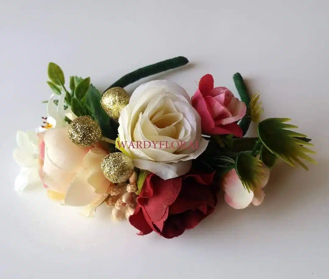 Christmas wrist corsage. 1 Christmas wrist corsage.