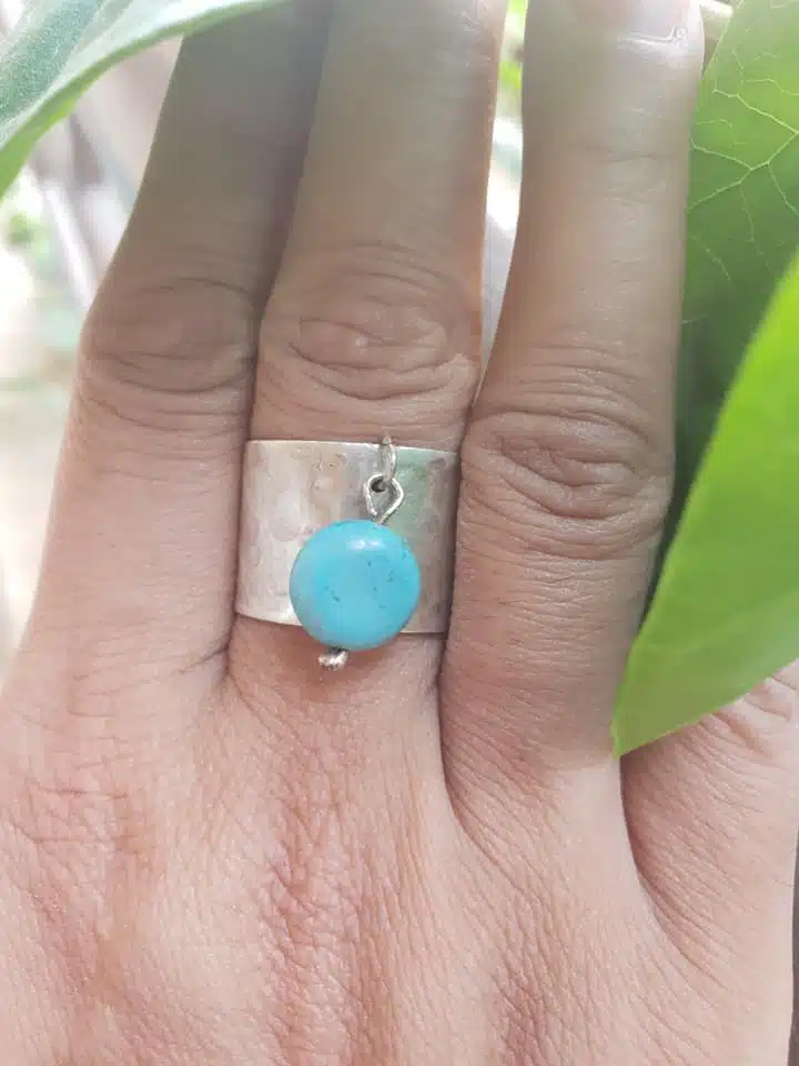 Silver hammered ring with dangling turquoise 3 Hammered with dangling turquoise stone 2