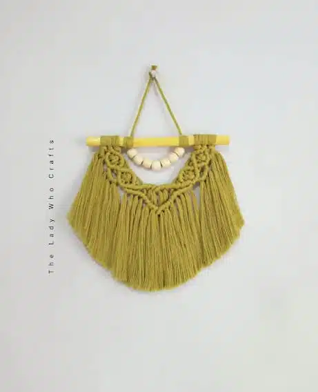 Mini macrame wall hanging 1 green Mini macrame wall hanging with beads