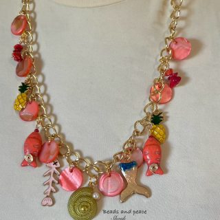Red fish, coral necklace