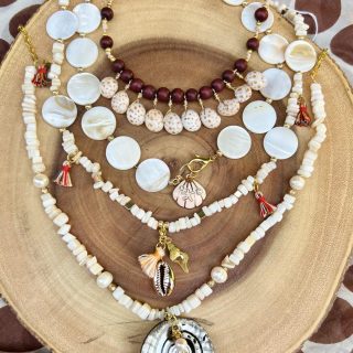 Summertime, mother of pearl, seashells necklaces, sold separately.