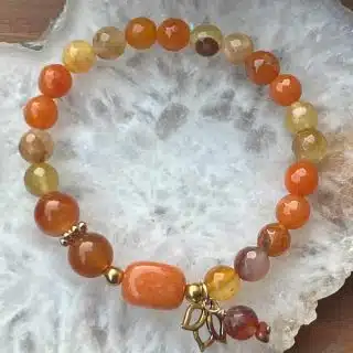 Orange agate, carnelian nuggets stretch bracelet, gold filled spacers.