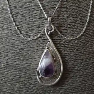 Silver tear drop pendant with amethyst