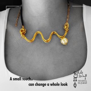 Handmade brown leather & golden copper necklace with pearl pendant.