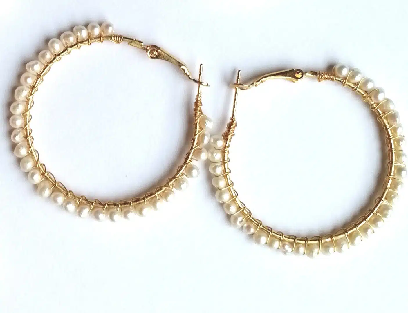 Gold plated earring with natural pearls 1 Gold plated earring with natural pearls