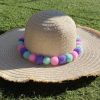 Pompoms hat