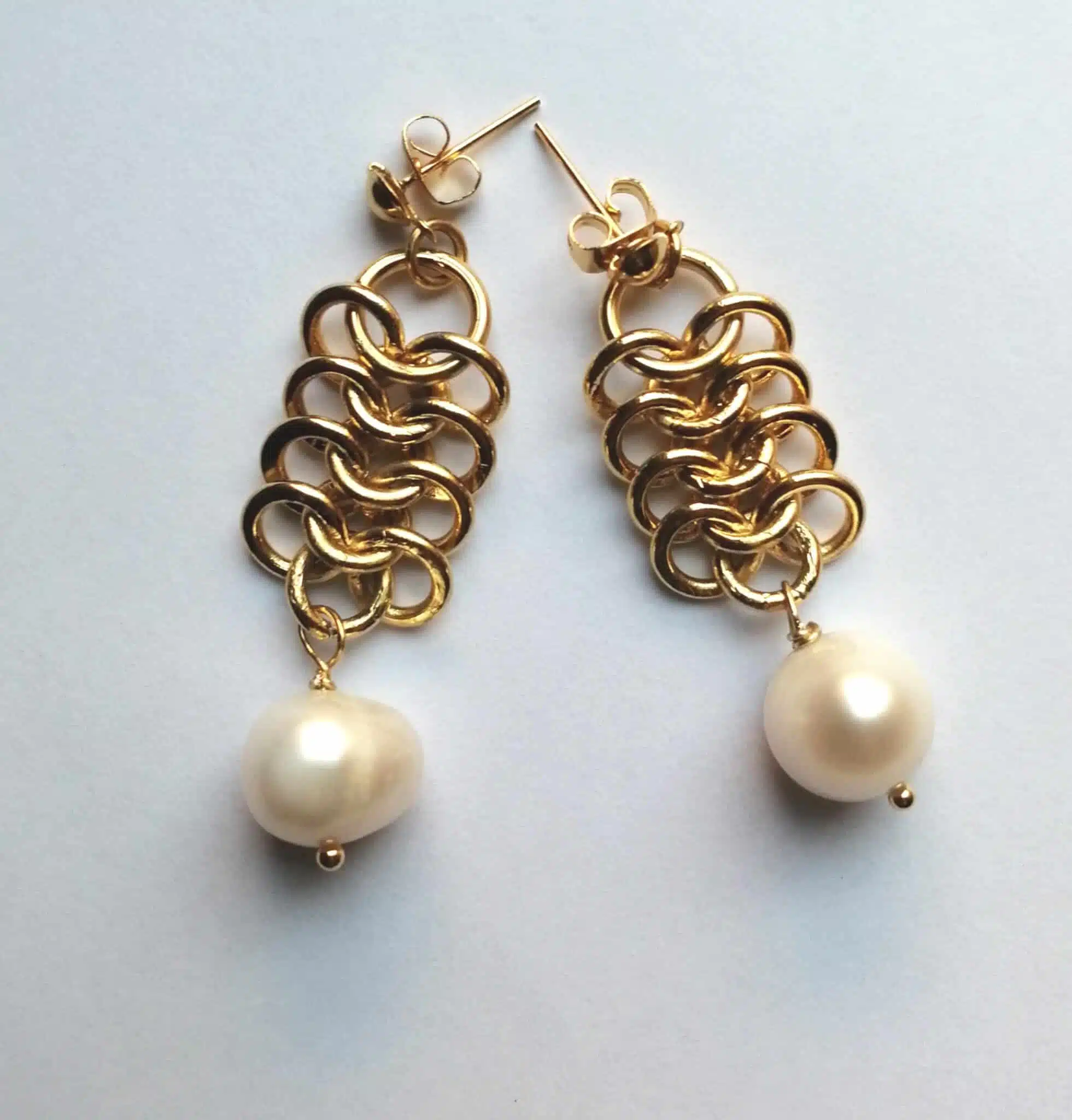 Gold plated earring with natural pearls 1 Gold plated earring with natural pearls