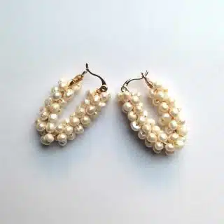 Gold plated earring with natural pearls