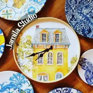 Yellow house wall clock