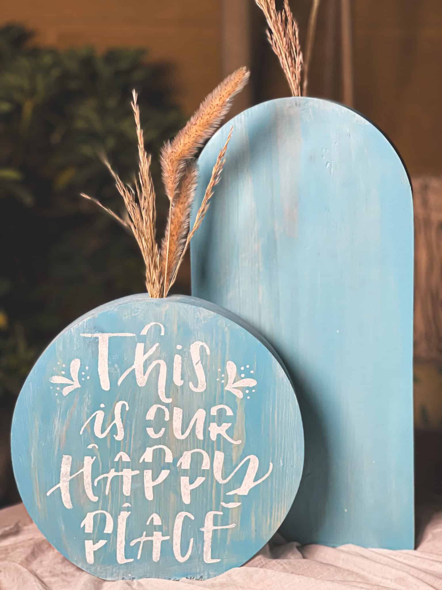 Set of two natural wood vases