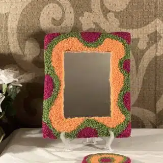 Pink, orange and green rectangular mirror frame