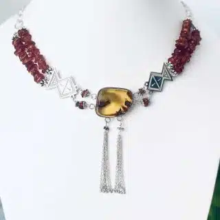 Silver necklace with amber stone and beads