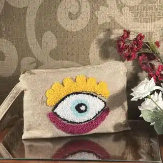 Colorful evil eye jute clutch