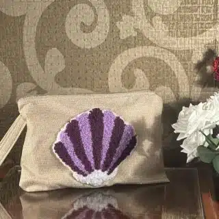 Purple seashell jute clutch
