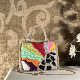 Colored tufted jute bag