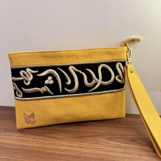 Yellow calligraphy pouch