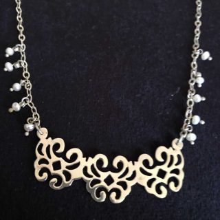 Silver necklace and fresh water pearl.